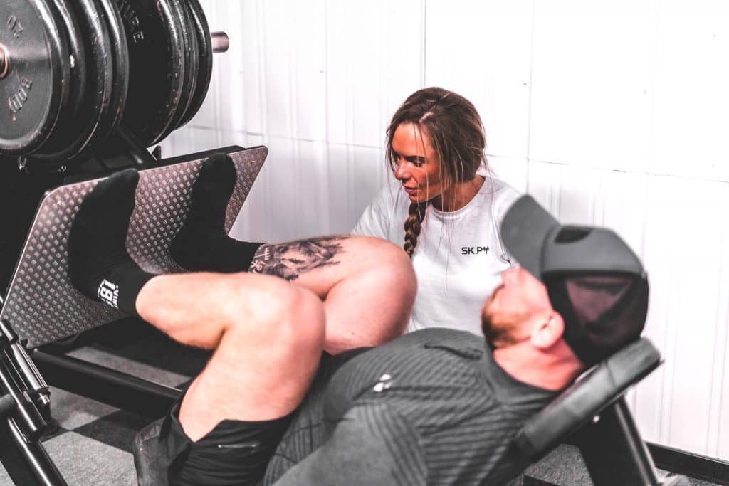 Man building muscle on leg press